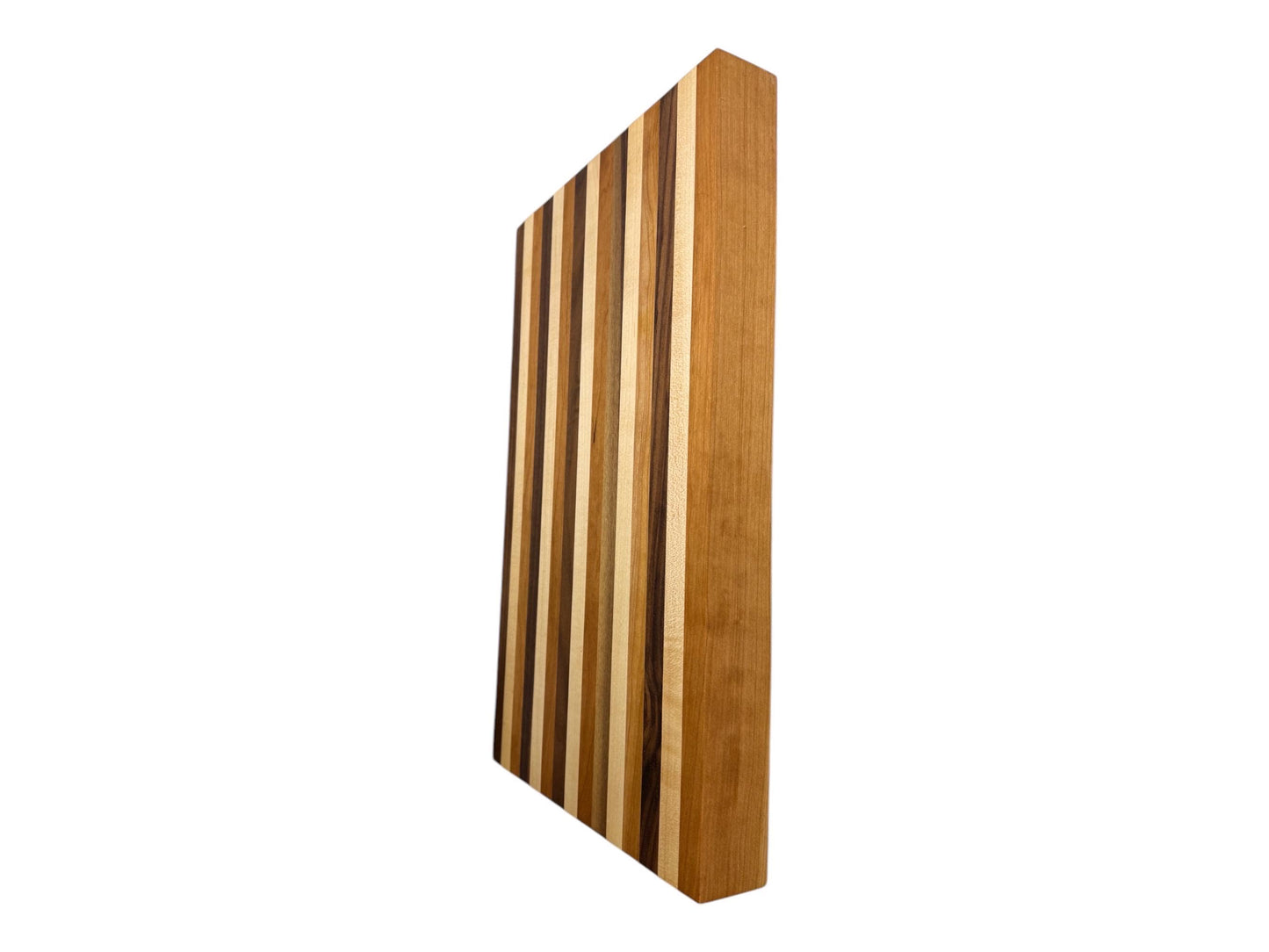 Handmade cutting board made from walnut, cherry, maple wood.