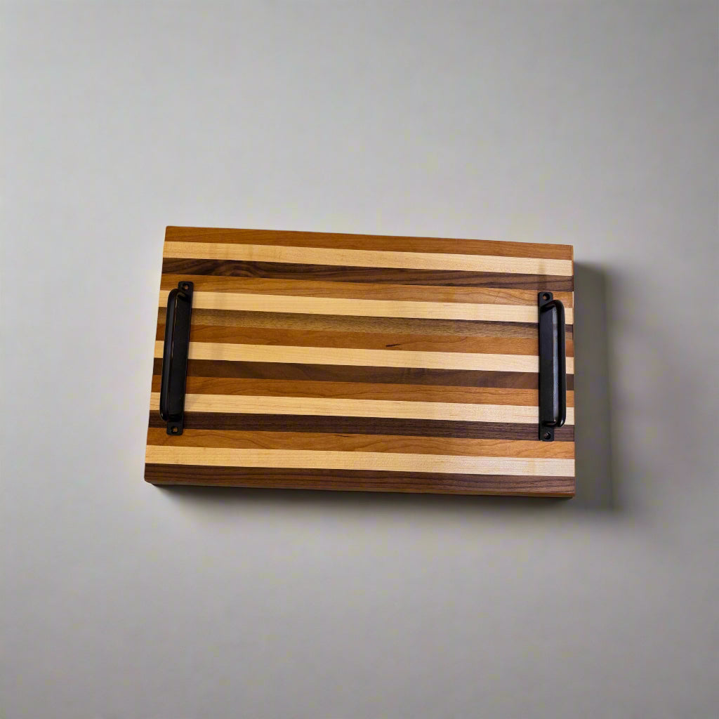 Handmade cutting  board made from walnut, cherry, maple wood.