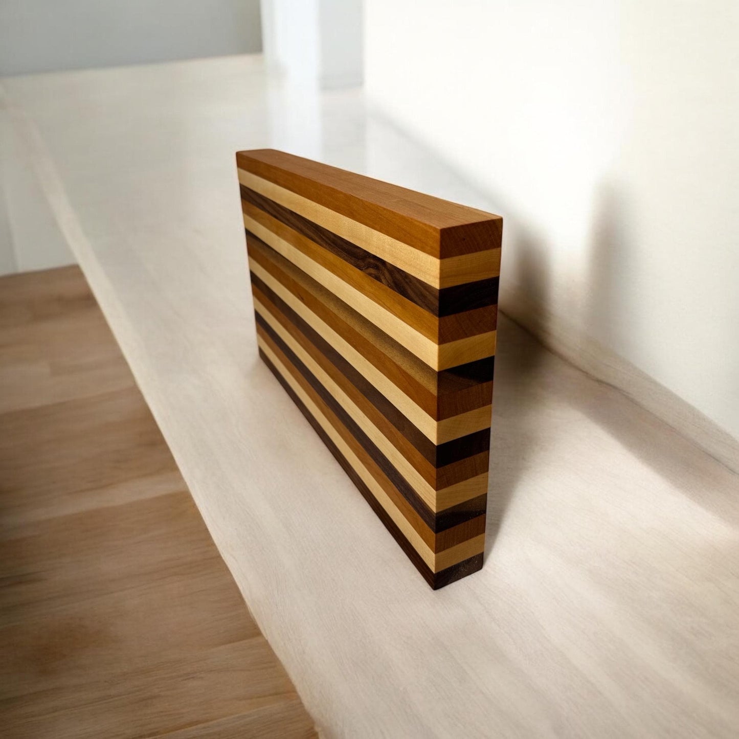 Handmade cutting  board made from walnut, cherry, maple wood.
